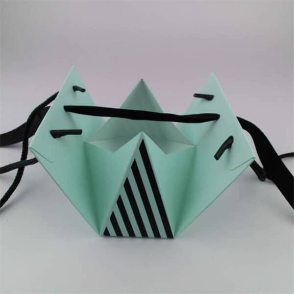 display the custom blue triangle style paper bag in the unfolded state
