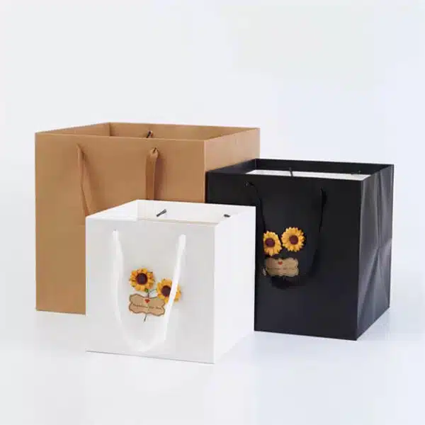display three custom square kraft paper bags in sunflowers decorative with rope handles