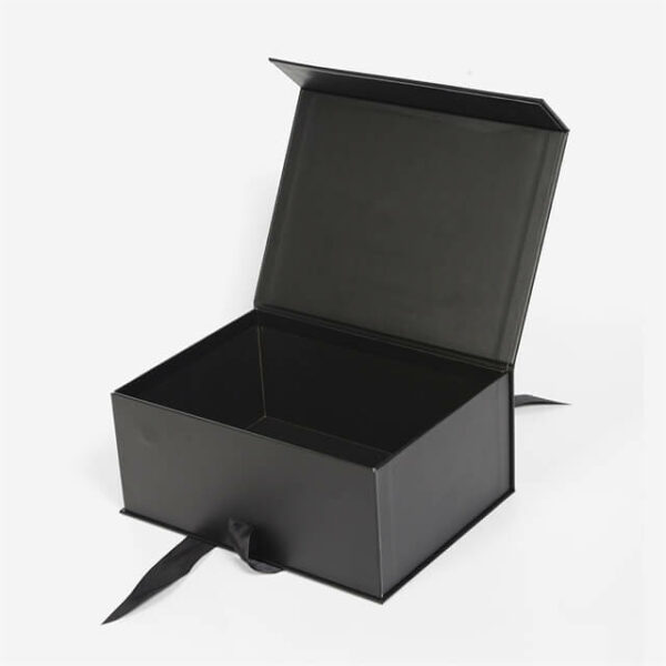 display the black custom flip top gift box with ribbon closure in the open state