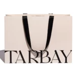 აჩვენეთ დიდი მორგებული ქაღალდის სავაჭრო ჩანთის წინა მხარე კომპანიის ლოგოთი