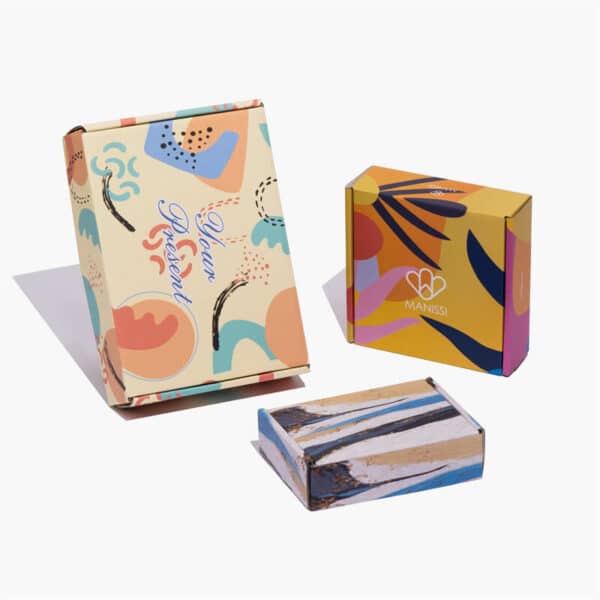 three different outlooks custom colored mailer boxes be placed artistically