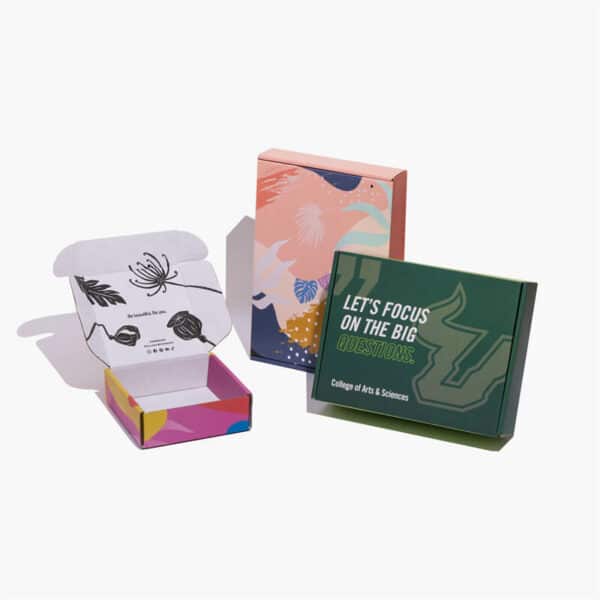 three various appearance custom colored mailer boxes be placed artistically