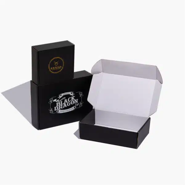 three custom black mailer boxes be placed artistically