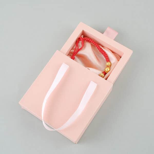 прикажете една розова кутија за фиоки за нараквици од картон со рачка
