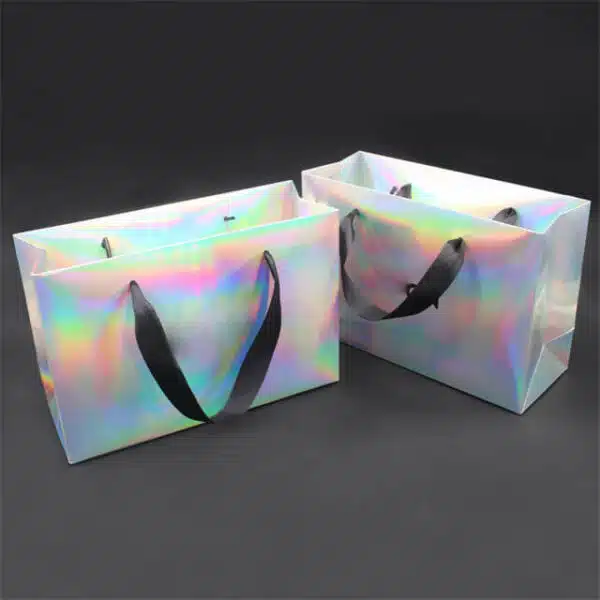 prikazati dvije prilagođene holografske papirnate vrećice s vrpčastim ručkama