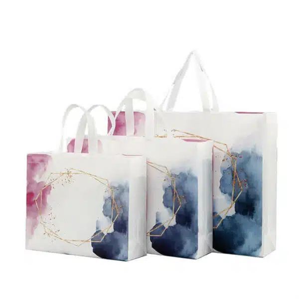display three printed custom non woven laminated bags in different sizes