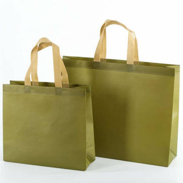 display two light green custom large commerce non woven tote bags in different sizes
