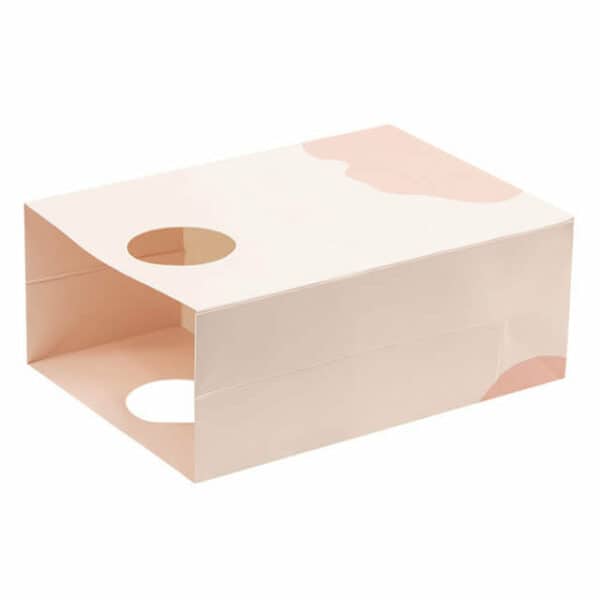 izložite prekrasnu prilagođenu papirnatu vrećicu s okruglim izrezanim ručkama u ležećem položaju