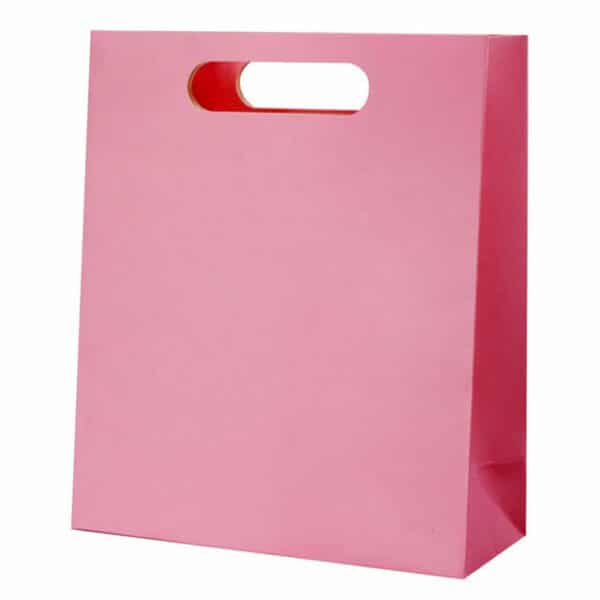 display one custom pink paper bag with die-cut handles