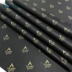 აჩვენეთ მორგებული შავი ქაღალდის რამდენიმე ფურცელი, რომელზეც ბრენდის სახელია